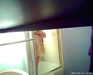 Son sets up spycam in shower to watch mom's giant scoops