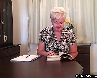 Chubby granny in nylons plays with sex-toy