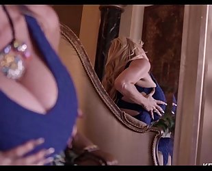 Sexy milf kelly madison shakes her massive love muffins in a blue suit